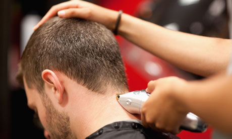 Close up of a male student having a haircut